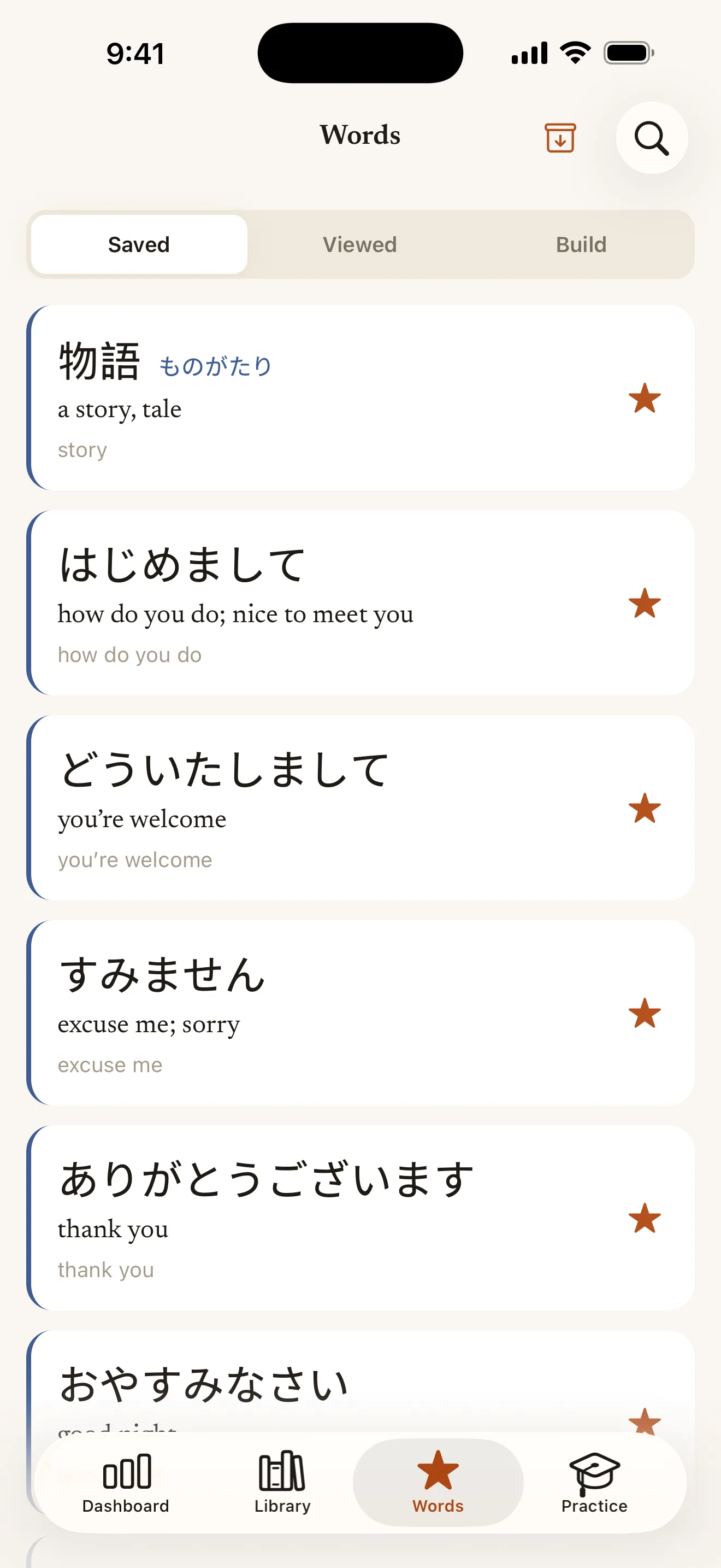 The Words tab showing saved words with stars and a graded catalogue